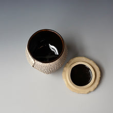 Lidded tea cup