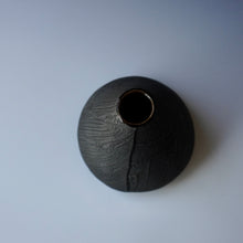 Round bud vase