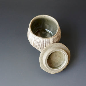 Lidded tea cup