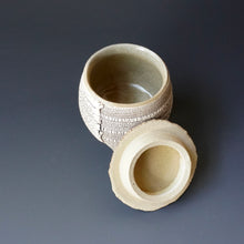 Lidded tea cup
